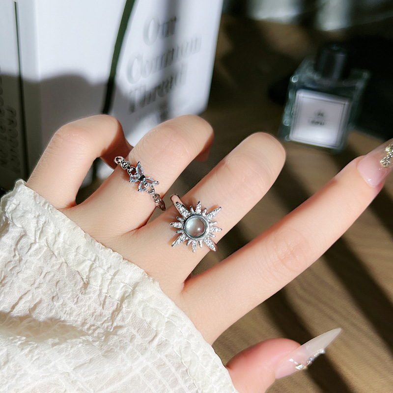 A simple and cold style star-shaped egg face open ring for women with blue diamonds and butterflies, exquisite, light luxury, niche and fashionable ring details Picture