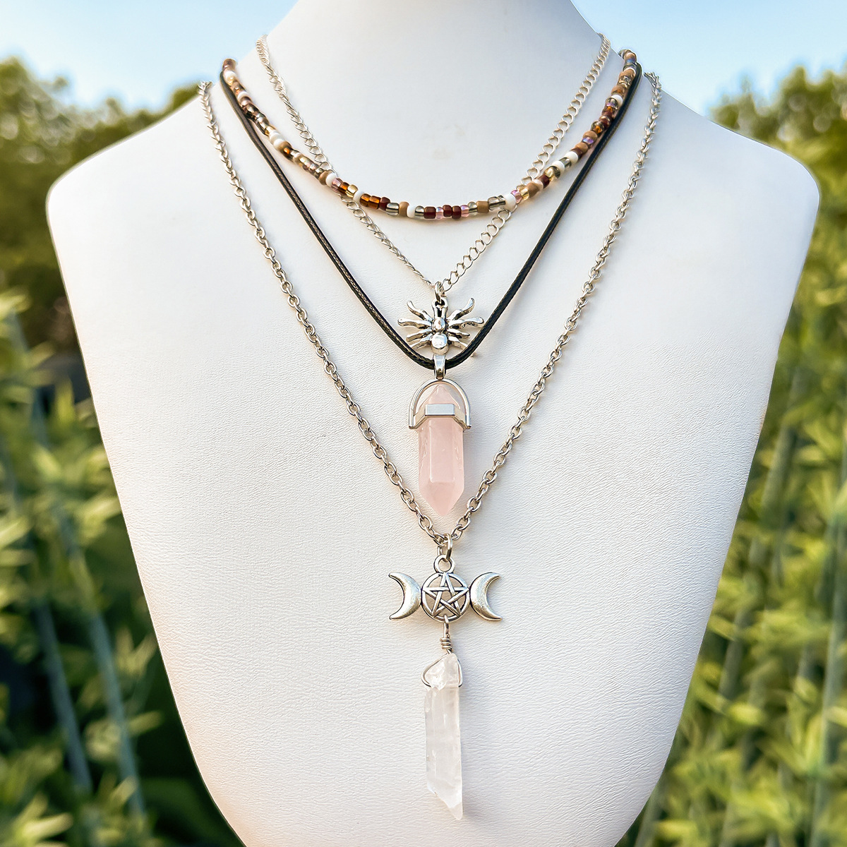 European and American cross-border jewelry: Simple and retro imitation crystal necklace, exaggerated layered butterfly Buddha's hand multi-layer tassel necklace Application Scenario