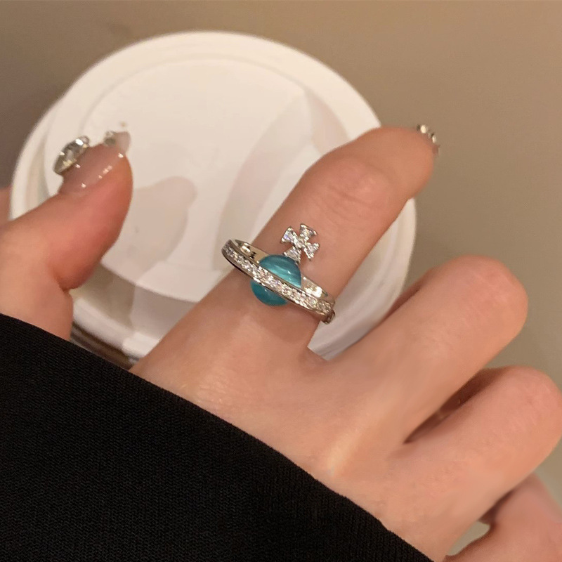 Three-dimensional Saturn sea blue cat's eye open ring for women, a niche design on Instagram, with a high-end and exquisite stacked ring full figure