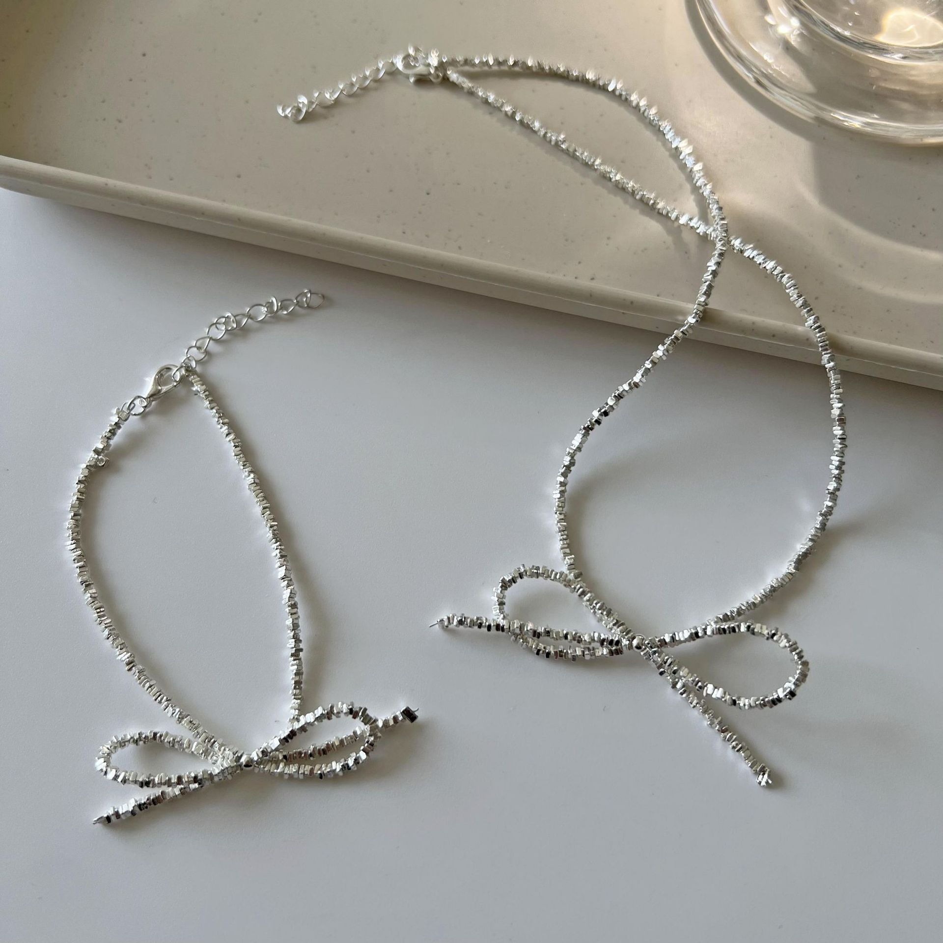 Super fairy fine glittering silver bow necklace for women, light luxury, elegant and sweet, fashionable and versatile neckchain, collarbone chain details Picture