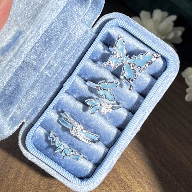 The new silver-white-blue gilded enamel liquid butterfly opening ring for women features a simple and niche design with a light luxury feel Specification drawing
