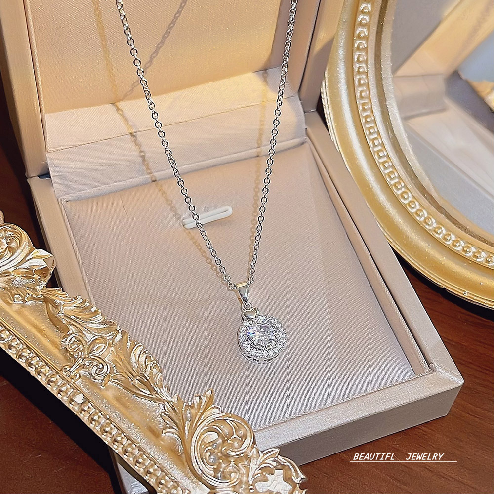 Korean light luxury geometric zircon titanium steel necklace, women's niche super sparkling pendant, sweet and simple collarbone chain wholesale full figure