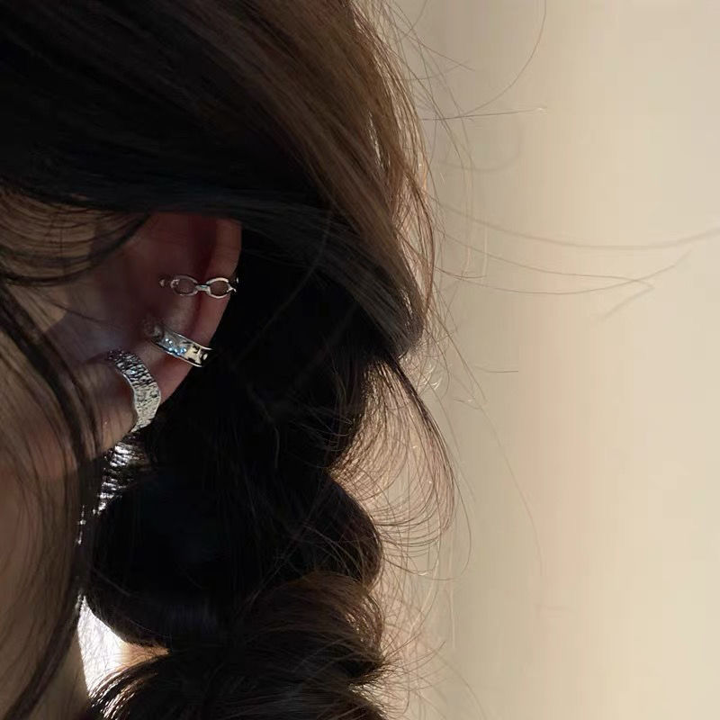 Hip-hop ear bone clips, cold style for men, punk, lava, concave-convex texture, chain, irregular edge metal earrings, niche for women Item Picture