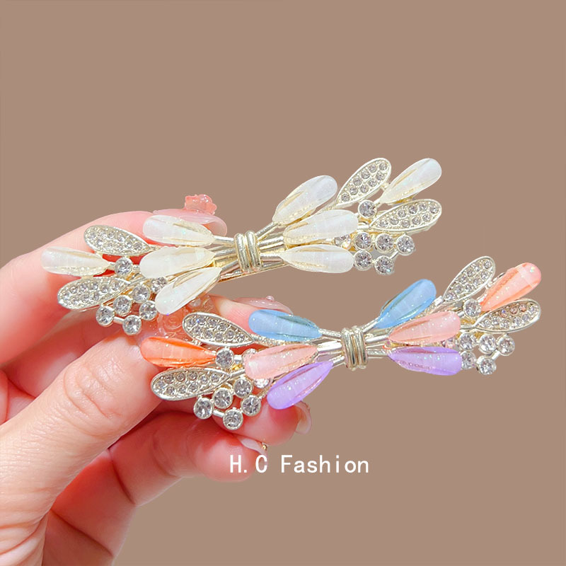The 2025 new high-end crystal spring hair clip is elegant and feminine. It is a semi-coiled hair clip accessory for the back of the head details Picture