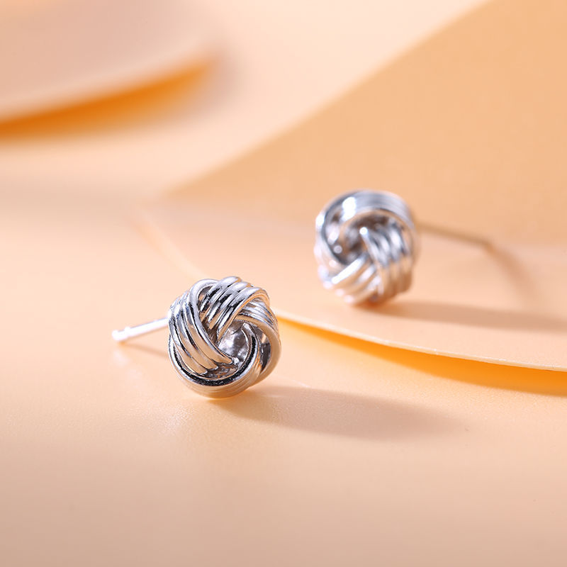 Wholesale of 2025 new style simple and classic, elegant and high-end, personalized twisted earrings, twisted stud earrings, student accessories details Picture