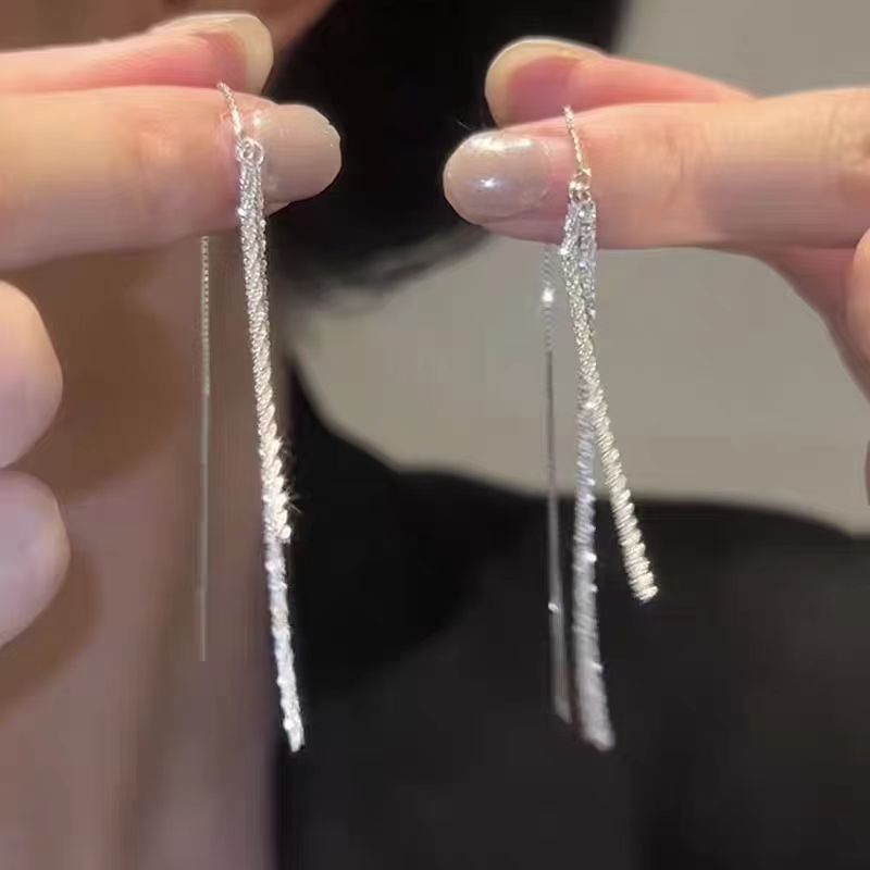 Elegant long round face slimming, galaxy tassel earrings, fashionable and niche design, high-end feel, versatile new earrings for women full figure