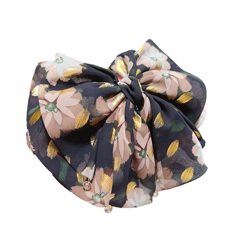 The new French retro floral bow clip is elegant and stylish, adding volume to the back of the head in a ponytail bun Item Picture