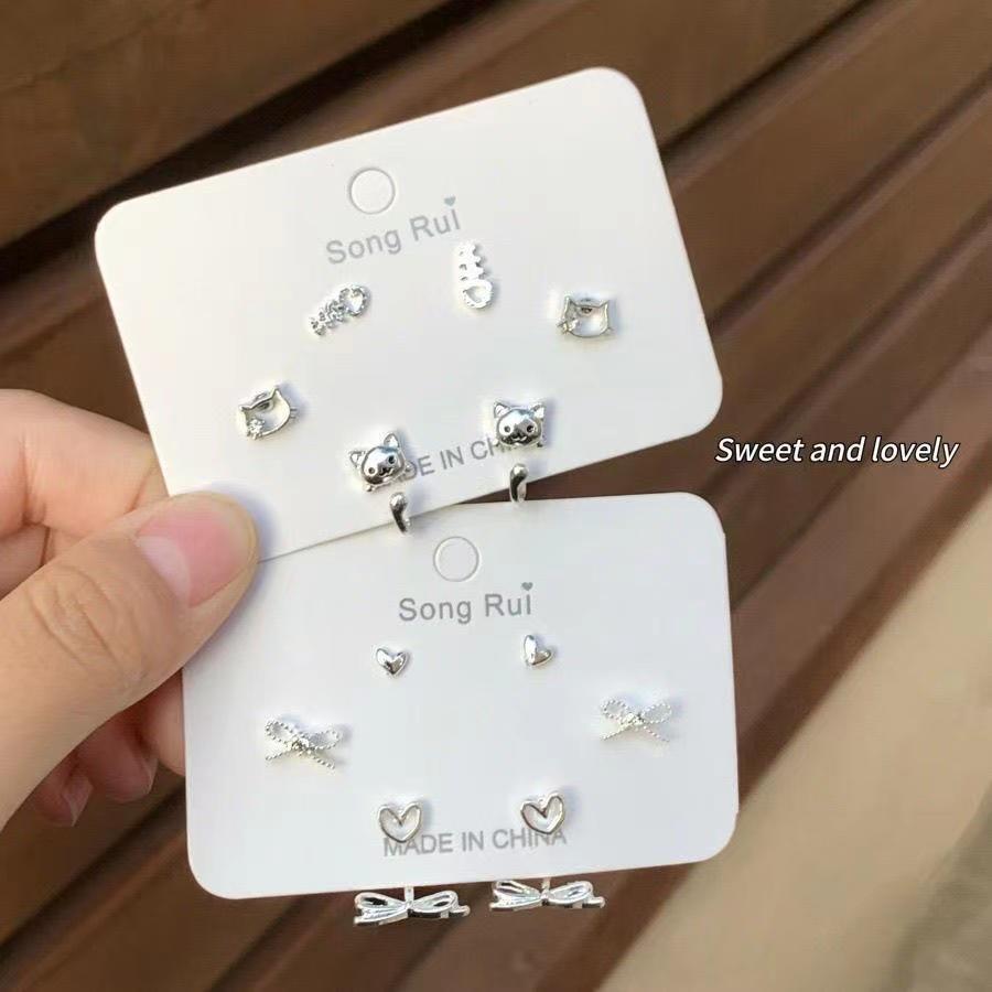 A pair of bow stud earrings with a light luxury and cold style, simple earrings, fashionable and elegant, niche earrings for women full figure