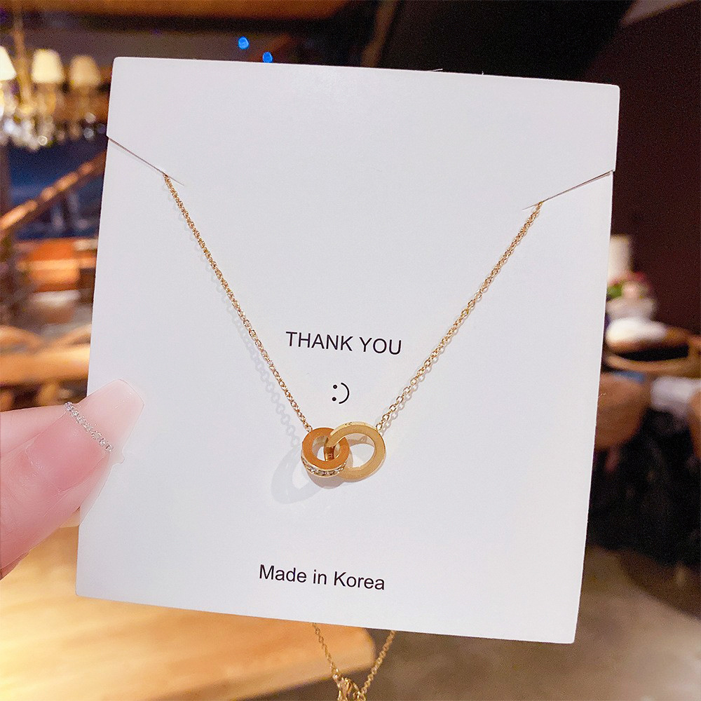 This light luxury and niche design necklace does not fade. It features a Korean-style creative double-ring collarbone chain with a fashionable and ladylike style full figure