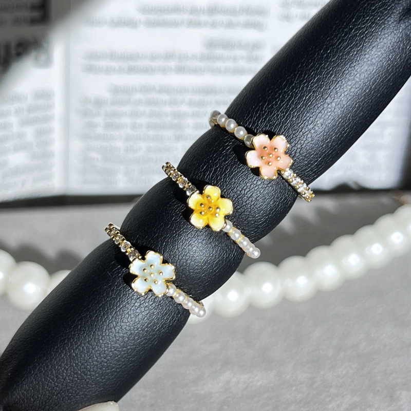Sweet Daisy small flower pearl light luxury open ring, women's gradient enamel exquisite and unique texture niche ring Specification drawing