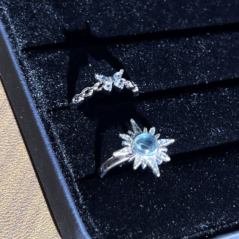 A simple and cold style star-shaped egg face open ring for women with blue diamonds and butterflies, exquisite, light luxury, niche and fashionable ring Application Scenario