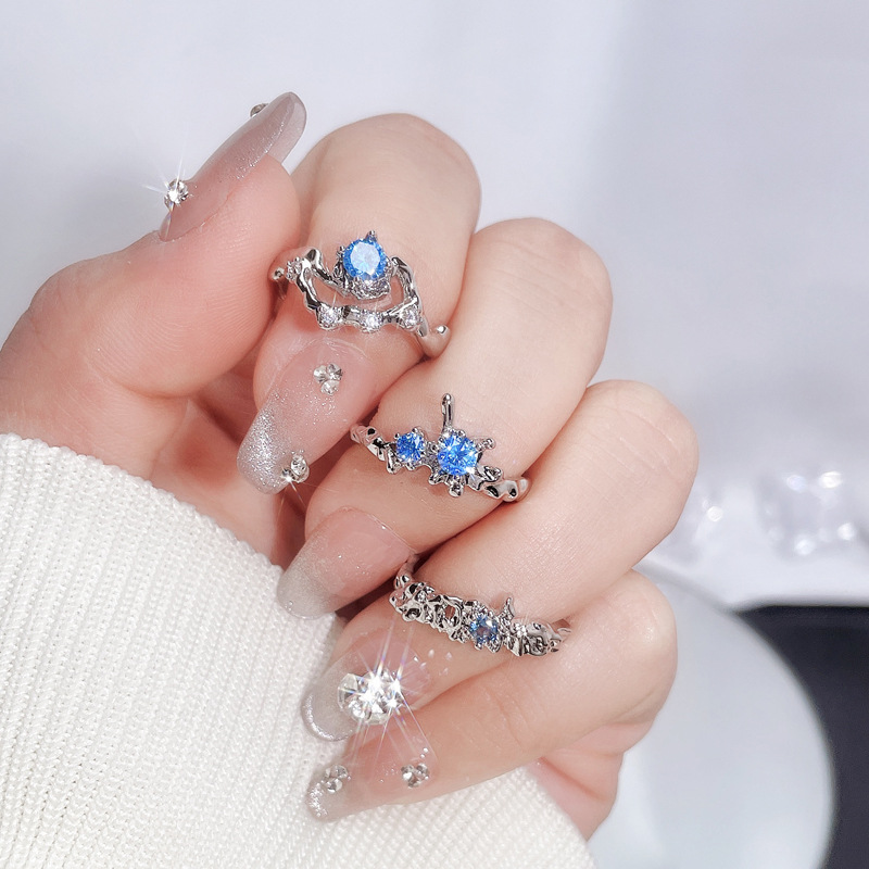 A light luxury and high-end sea-blue zircon open ring for women on Instagram, with a cold style, sweet and cool, irregular texture, and a trendy index finger ring Specification drawing