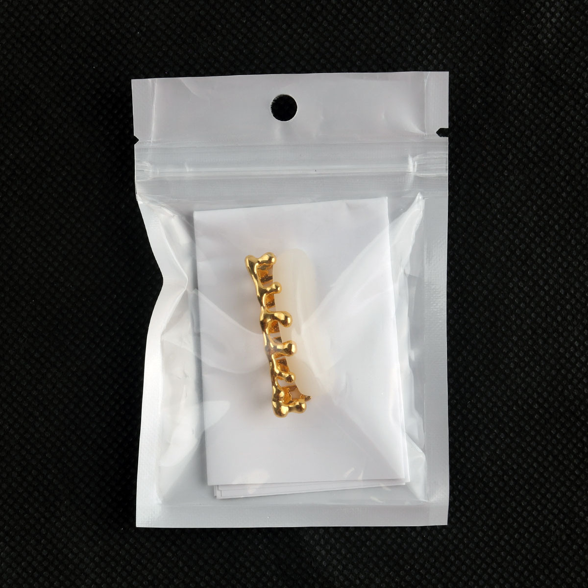 A new cross-border prop, the gold-plated water drop dental crown, is selling well in Europe and America Application Scenario