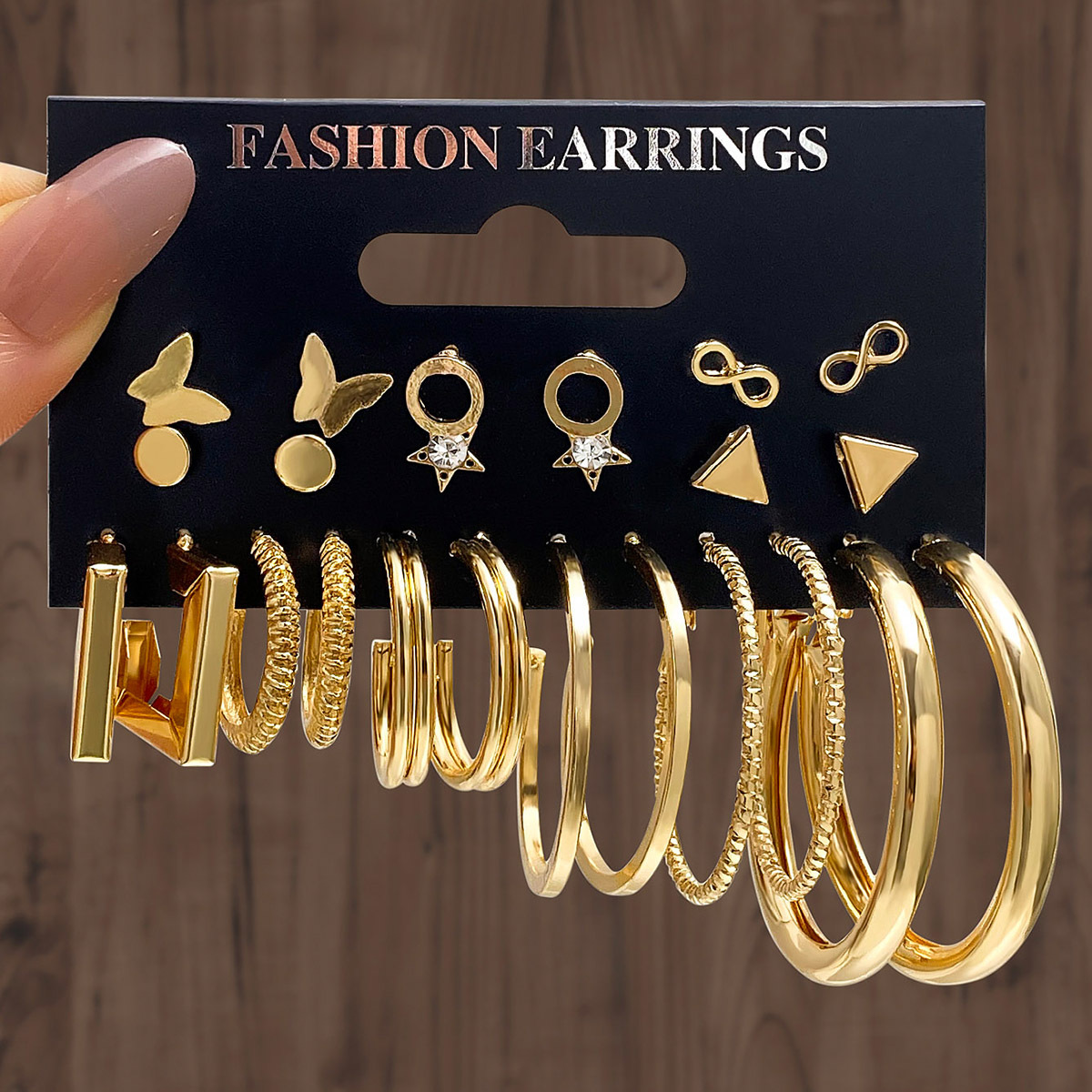 New cross-border alloy butterfly set earrings, fashionable and individual 8-shaped star butterfly circle earrings, 12-piece gold set full figure