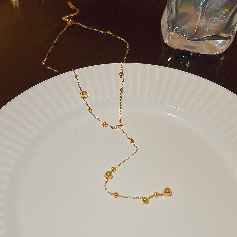 A high-end and elegant starry sky pearl tassel necklace for women on Instagram, a cold style collarbone chain, a versatile long sweater chain Specification drawing