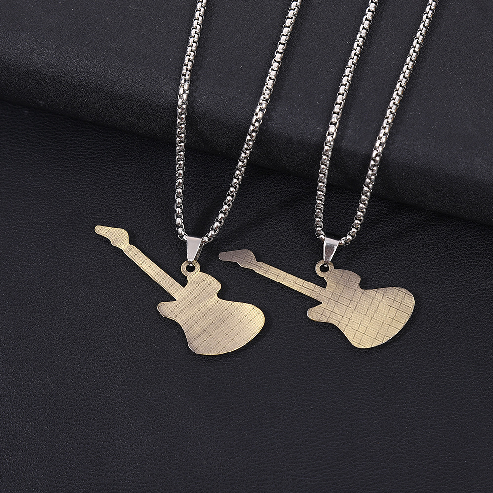 New personalized rock band guitar pendant accessory, a trendy and fashionable cross-color necklace and instrument pendant details Picture