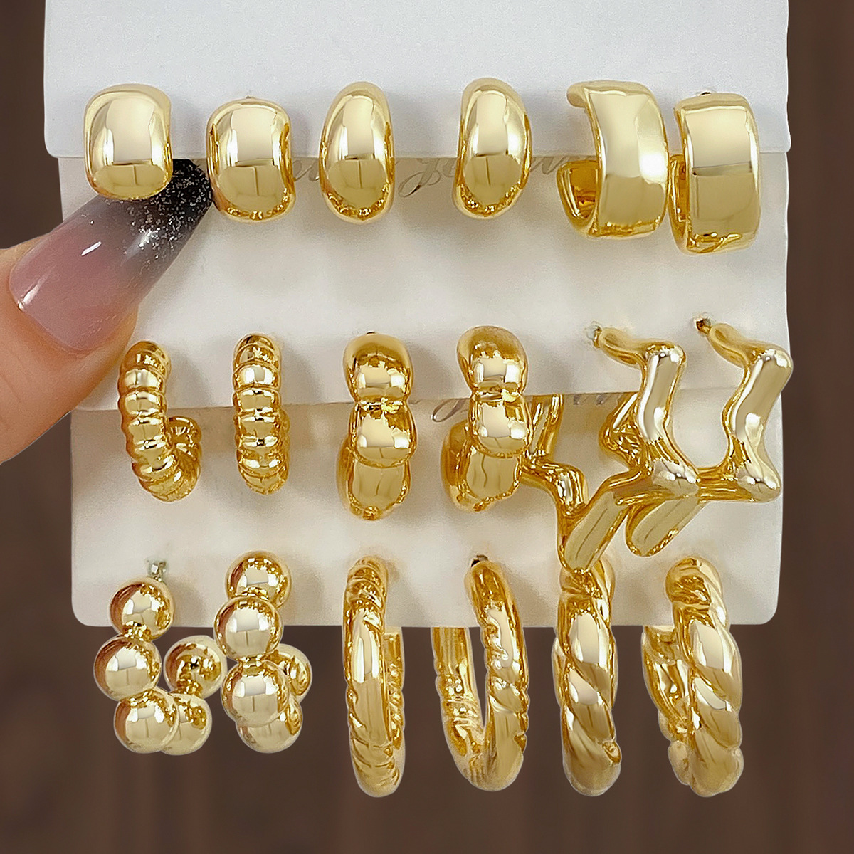 A new set of 3 pairs of high-end gold and exaggerated ccb earrings with a unique twist pattern from Europe and America Application Scenario