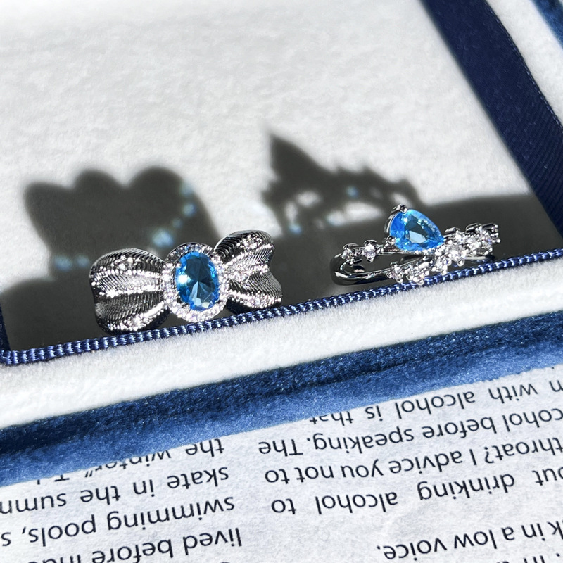 Super Flash Heavy Industry Water Drop Sea Blue Diamond Pigeon Egg inlaid open ring, feminine, niche bow light luxury ring Specification drawing