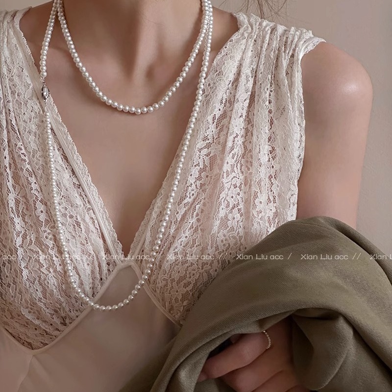 A variety of wearing methods, long pearl necklace, round and bright, with a light luxury and French style full figure