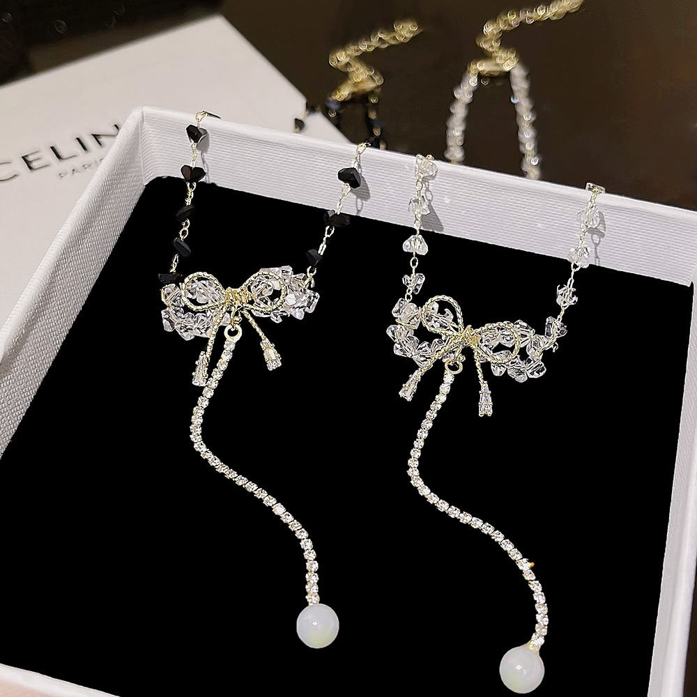 European and American super fairy crystal tassel bow necklace, women's niche light luxury exquisite collarbone chain, ins style sweater chain Application Scenario
