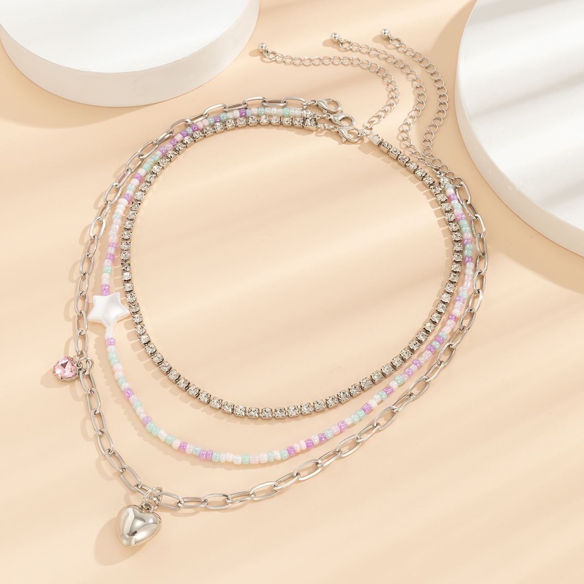 A sweet and cool mixed and matched European and American cross-border jewelry necklace with contrasting colors of rice beads and stars, a retro and versatile heart-shaped water diamond necklace Application Scenario