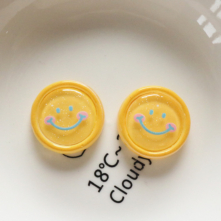 Transparent butterfly smiling face diy handmade children's hair clips, hair strings, materials, clothing, shoes, buckles, hats, resin accessories wholesale Application Scenario