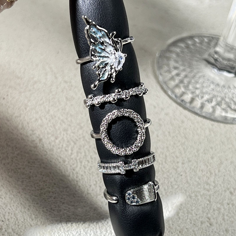Minimalist Korean-style flapped butterfly irregular pleated texture open ring female letter full diamond fashionable niche ring Application Scenario