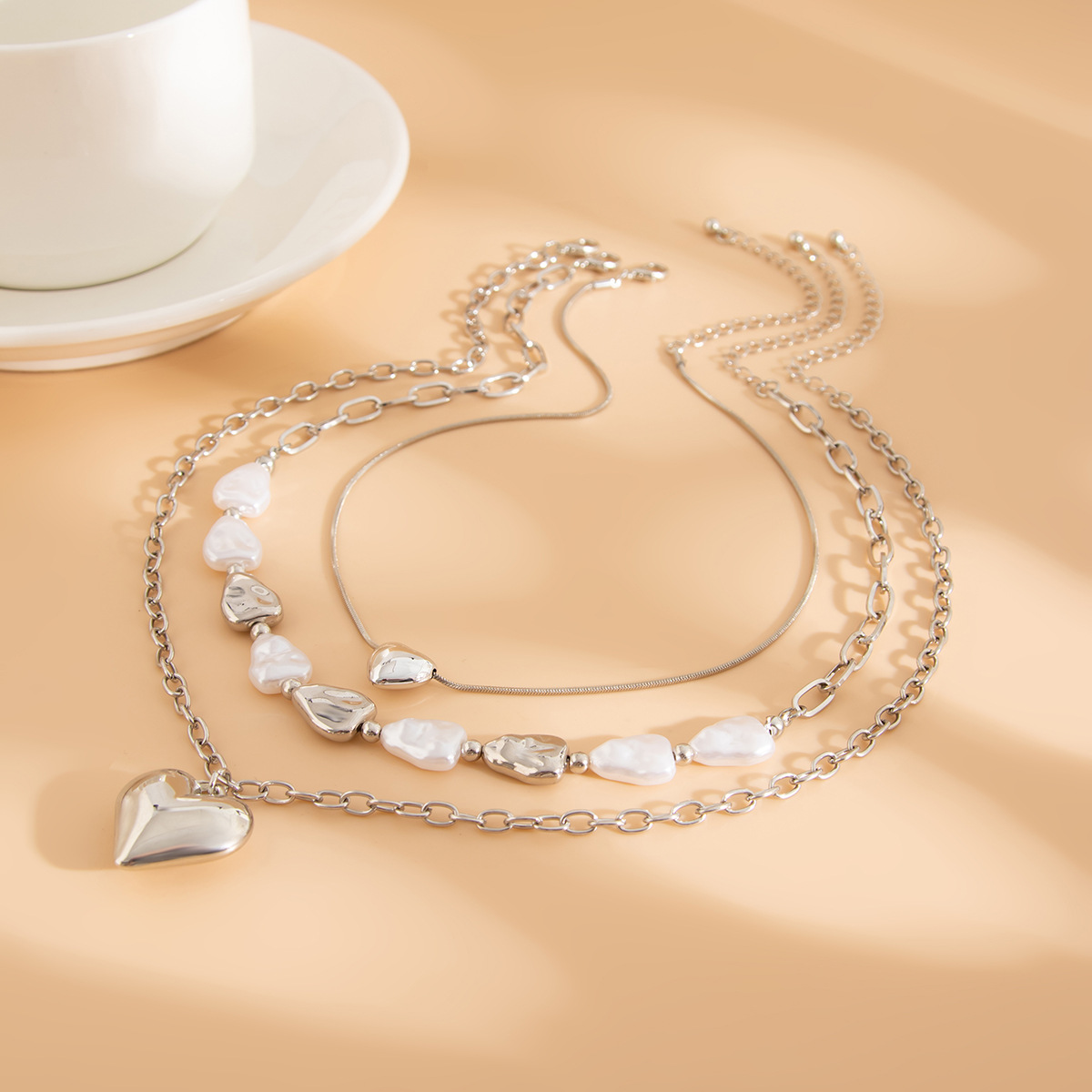 European and American cross-border jewelry, Baroque heart tassel pendant, collarbone chain, irregular flat pearl necklace set Application Scenario