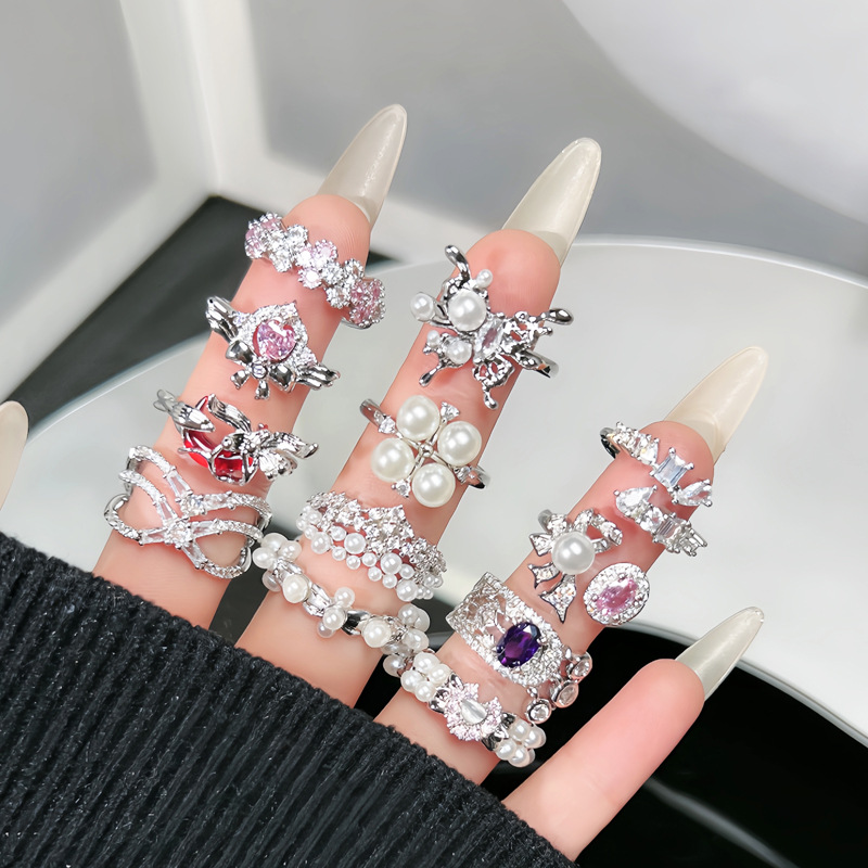 French pearl light luxury high-end ring, women's irregular bow, Hong Kong style, fashionable and cold style ring trend full figure