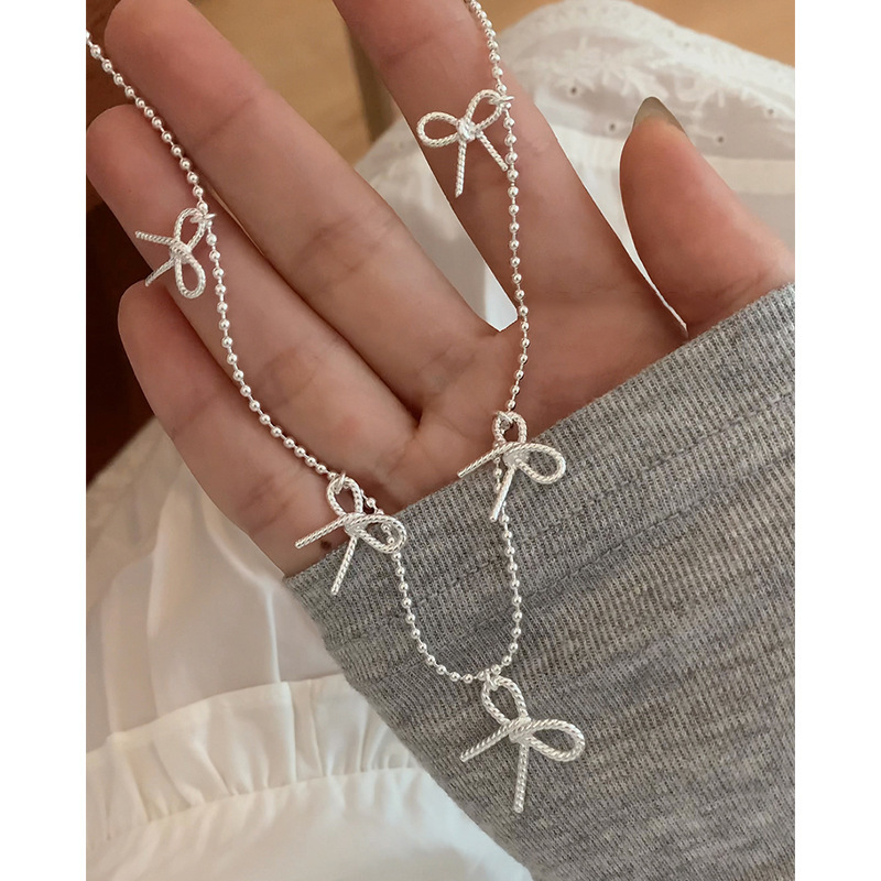 Korean-style light luxury, niche and girlish sweet bow necklace, simple and heavy style collarbone chain, round bead chain Specification drawing