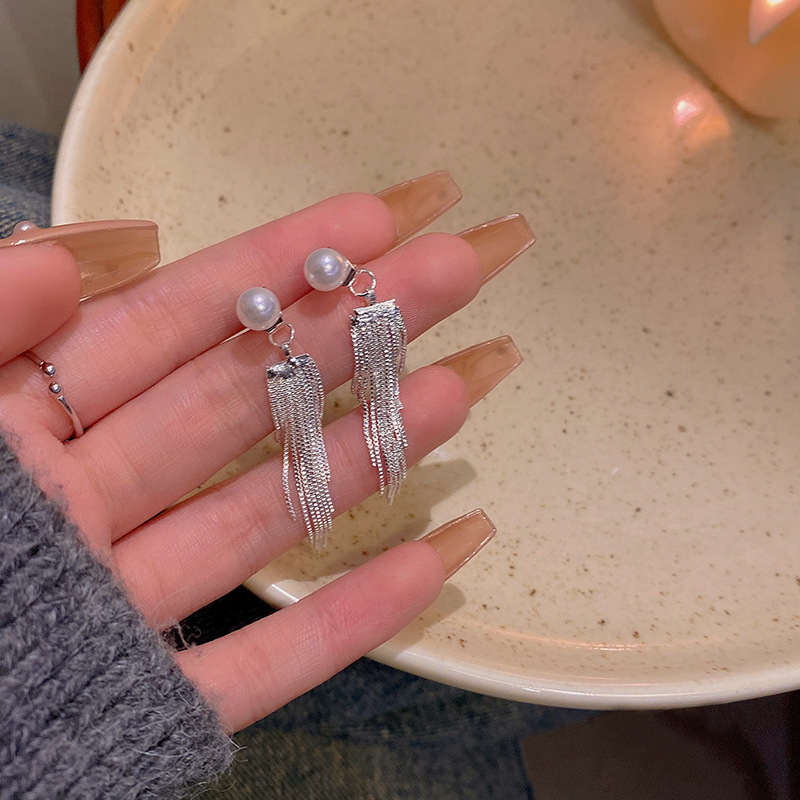 S925 Silver Needle Pearl Tassel Earrings, a unique, niche and high-end design for women, are versatile and personalized bestsellers full figure