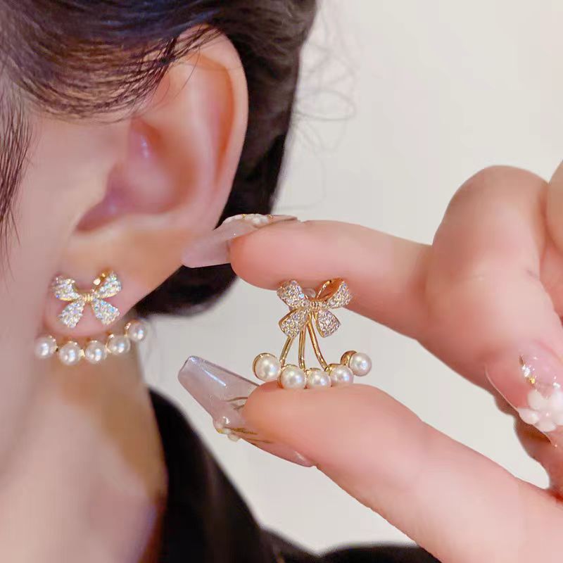 A pair of women's niche design bestseller earrings with two bow pearl stud earrings, a new bestseller in 2025 full figure