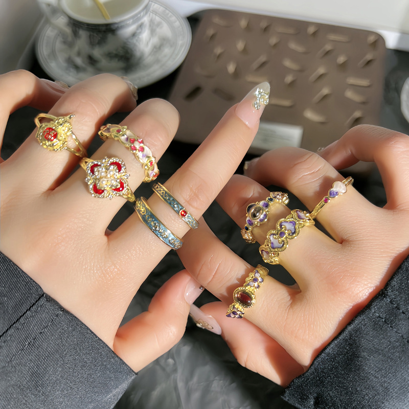 Xiaohongshu's sweet and cool, mid-style, light luxury four-leaf clover open ring, women's enamel drop glaze flower gourd elegant ring full figure