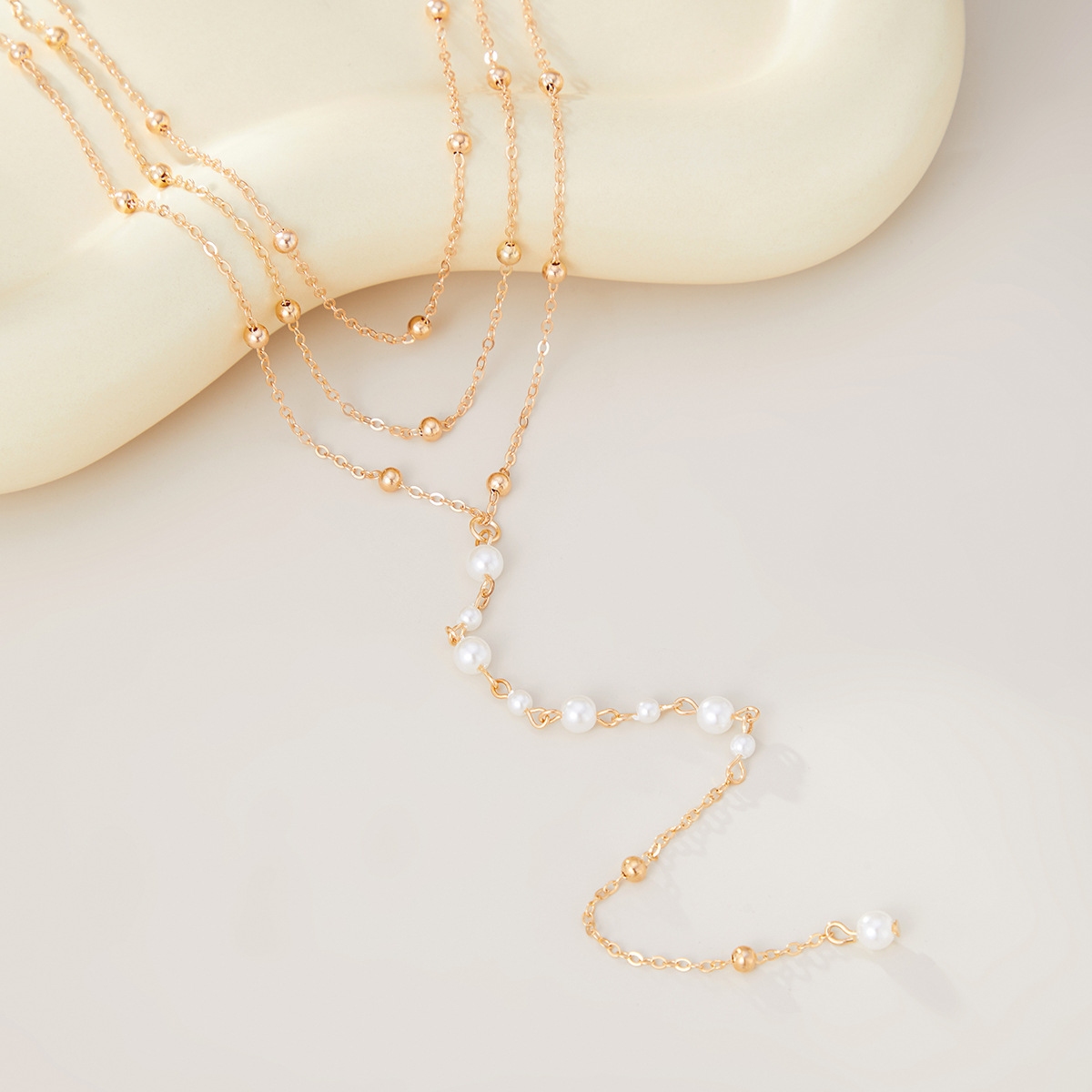 European and American cross-border jewelry, fashionable and simple tassel pearl beaded collarbone chain, multi-layer elegant copper bead chain, Y-shaped necklace Application Scenario