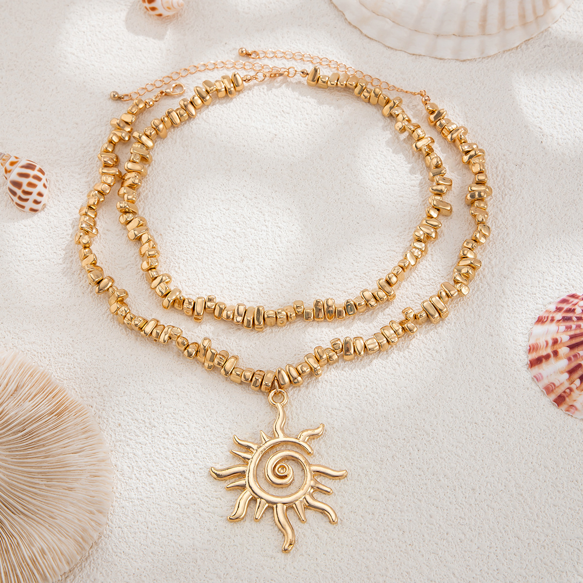 European and American cross-border jewelry ins hammer-patterned spiral sun metal pendant necklace, irregular-shaped CCB beaded collarbone chain for women Application Scenario