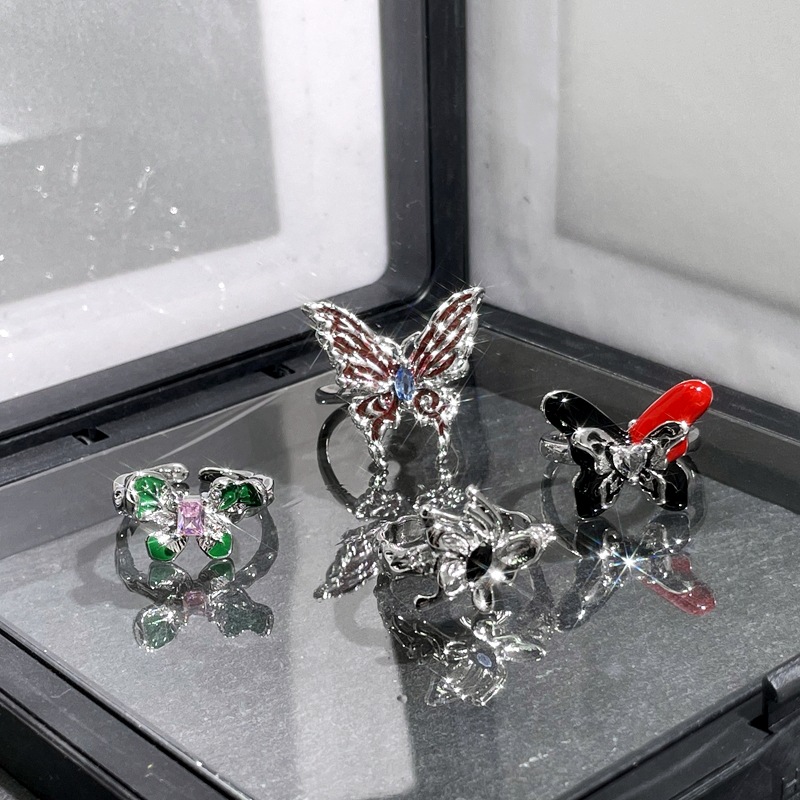 The butterfly ring with a sweet and cool drip glaze design from Europe and America is a niche, light luxury, fashionable and exquisite index finger ring with a cold and elegant style Specification drawing