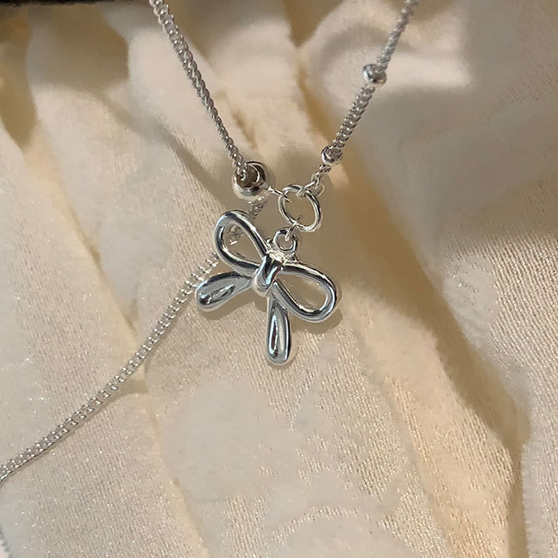 A design sense bow heart pull-out adjustable necklace for women, simple and elegant, light luxury, versatile neckchain, collarbone chain Application Scenario