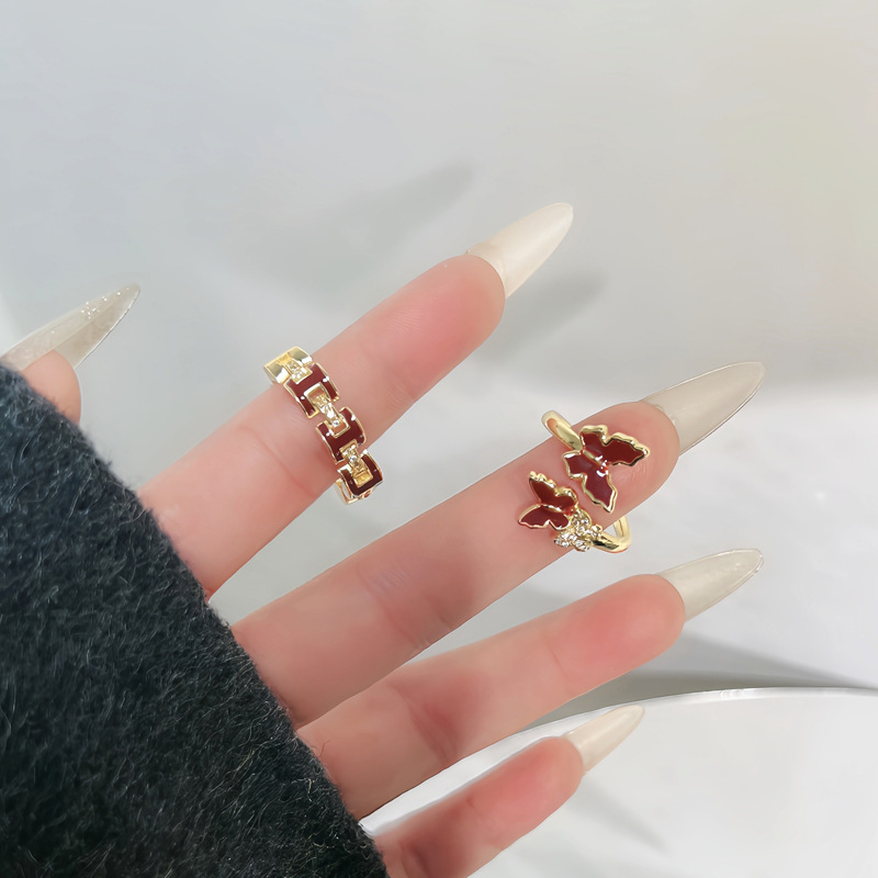 Wine red enamel H-letter ring, a light luxury and high-end women's butterfly sweet and cool index finger ring, a niche design bestseller ring full figure