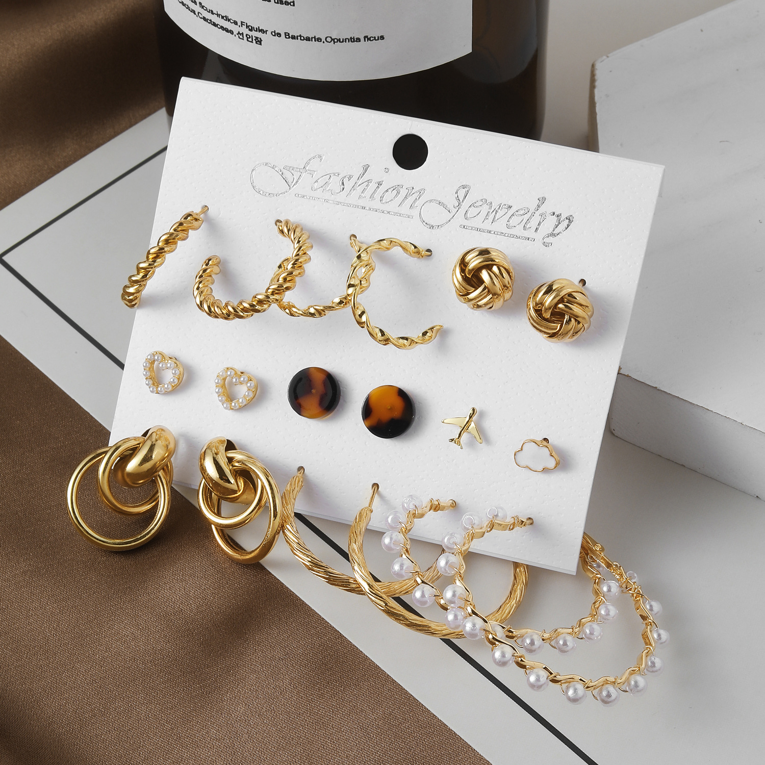 European and American cross-border creative, simple and elegant women's jewelry set, airplane white cloud stud earrings, pearl earrings 9-piece batch Specification drawing