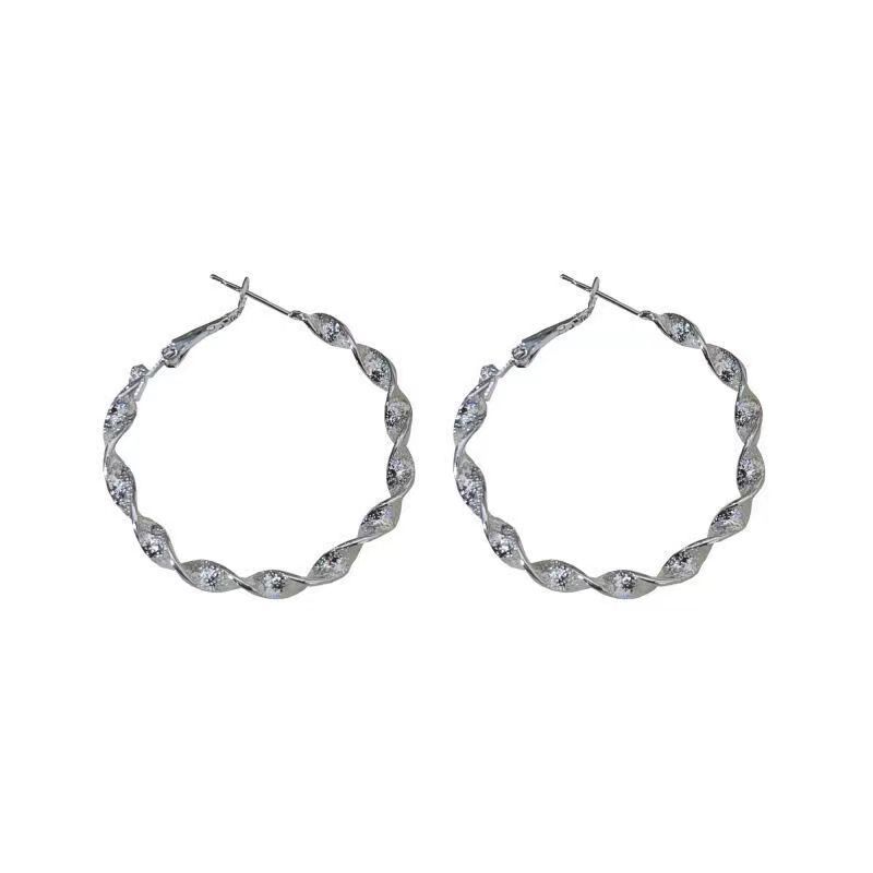 Korean niche design spiral-twisted ear loops for women's ins cold style circle stud earrings, fashionable, individual and versatile earrings Item Picture