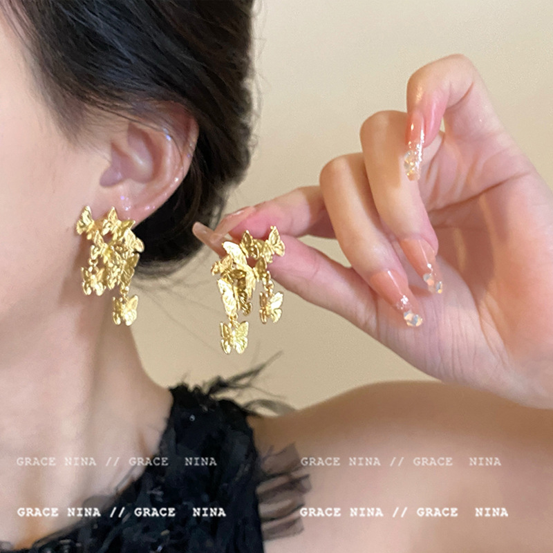 "Group of Butterflies Dancing: Retro golden butterfly Earrings for Women, 2025 New style, high-end, light luxury, niche and unique bestsellers. full figure