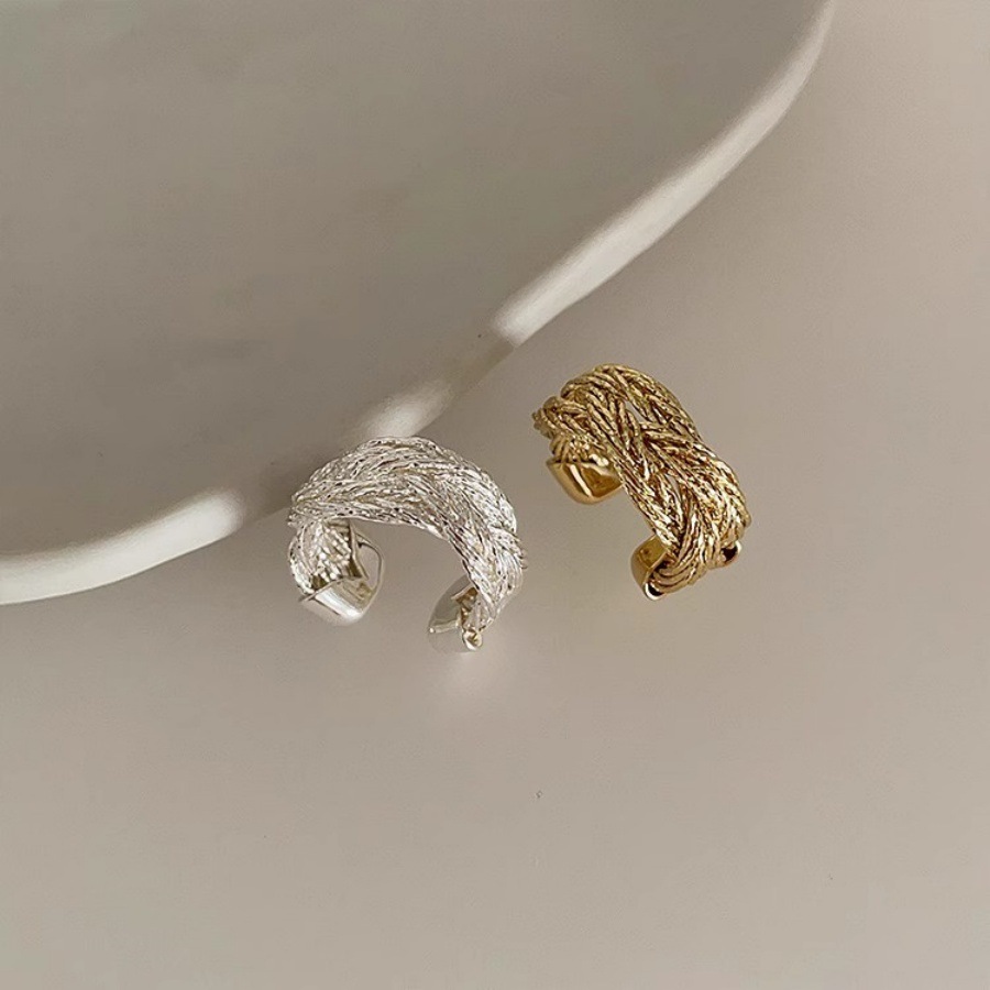 A retro woven and wrapped twisted wide open ring with a unique, simple and cold design for women Application Scenario