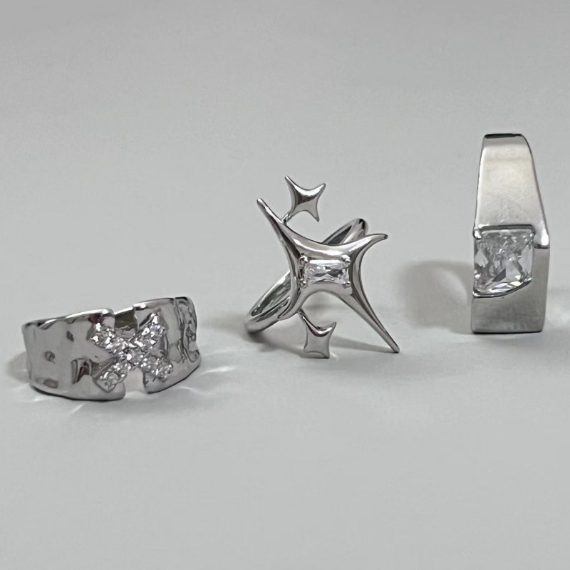 A niche starlight couple ring with a Korean Instagram trendy design sense, featuring letters X and zircon texture. It's fashionable and individualistic for women details Picture