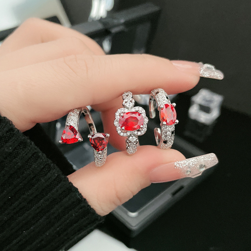 A high-end red zircon open ring with a touch of European and American style, a delicate oval-shaped design for women, sweet and cool, light luxury fashion, and a trend of wearing multiple rings details Picture