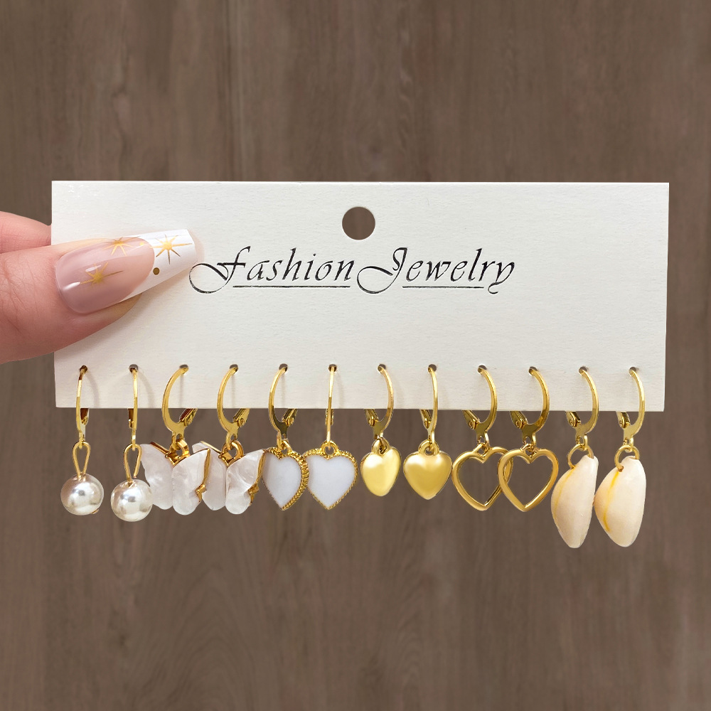 12 pieces of creative and personalized card-set earrings with cross-border alloy heart, pearl, snake, butterfly and mushroom lock ear buckles from Europe and America details Picture