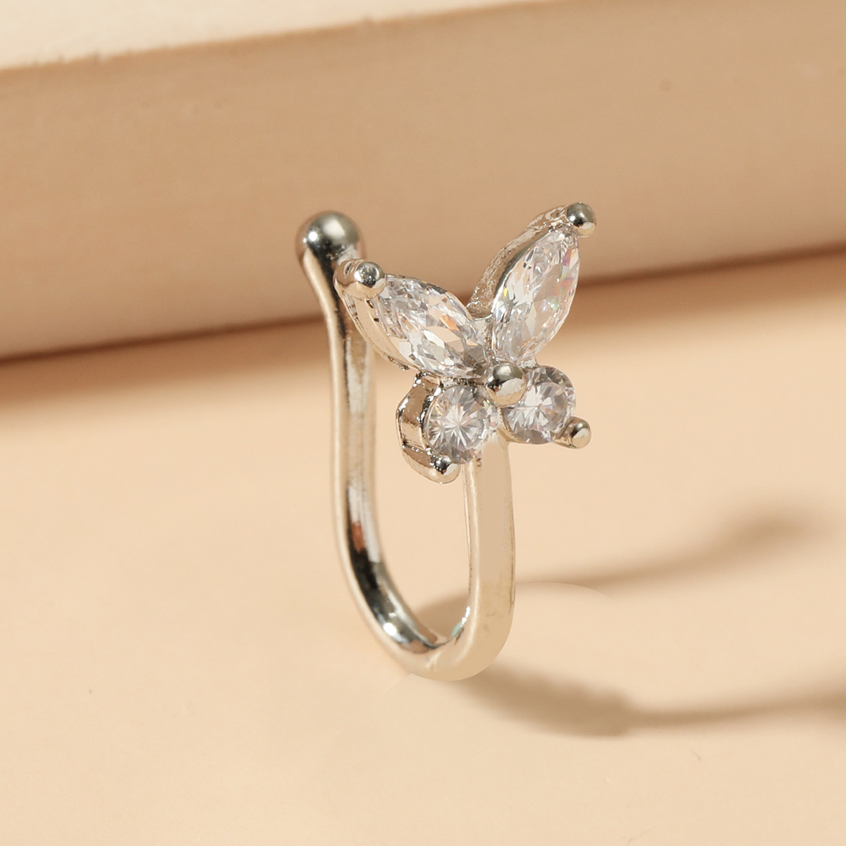 Cross-border European and American butterfly non-perforated nose clip and nose ring, retro and fashionable copper inlaid zircon U-shaped nose stud piercing accessory for women Application Scenario