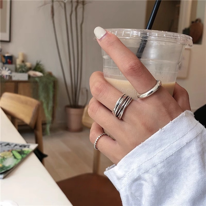 A retro multi-layer ring made of 925 sterling silver cross-wound from South Korea. It is a versatile open-top ring with a cold and elegant style for women on Instagram full figure