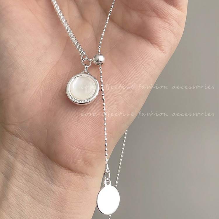 Double-sided black agate pearl pull-out necklace for women, 2023 new versatile silver sweater chain, ins style details Picture