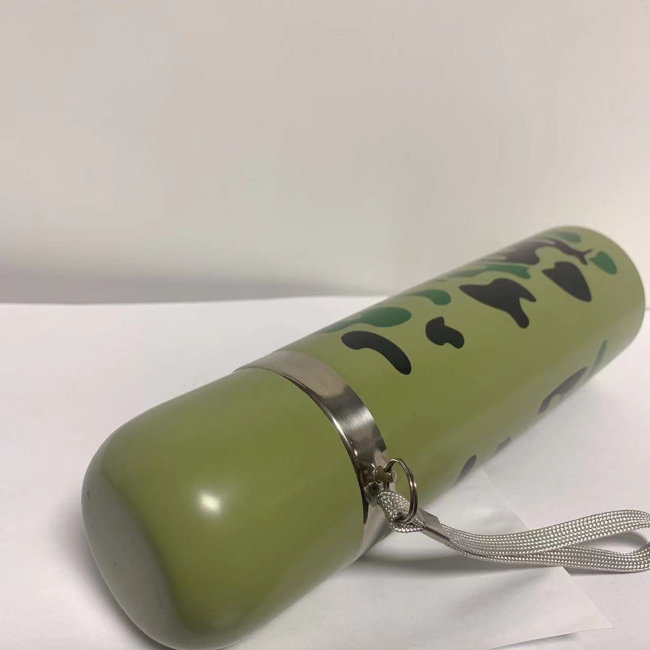 Camouflage insulated military training stainless steel vacuum sling in stock, gift cup, outdoor fitness 304 student bullet head Specification drawing