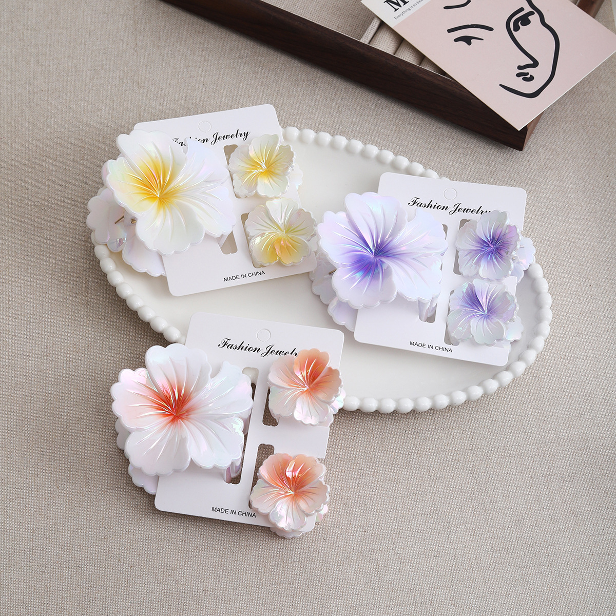 Laser European and American best-selling shell set, cross-border flower hair clip, women's fashionable vacation, shark clip on the back of the head for women full figure